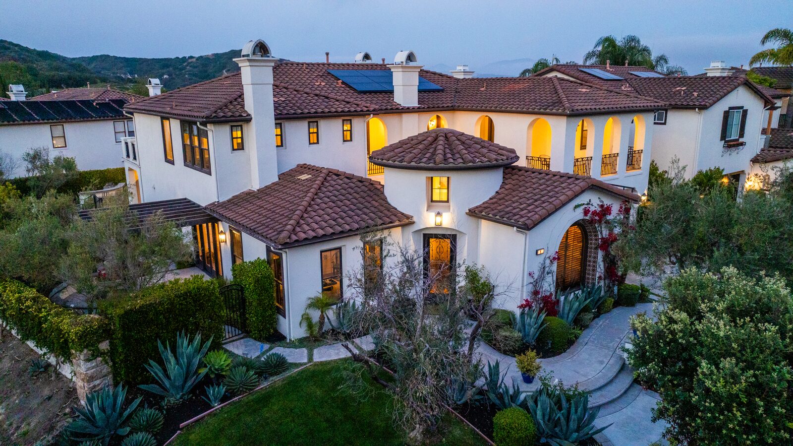 Aerial hero shot of a San Clemente home at blue hour for a public listing launch