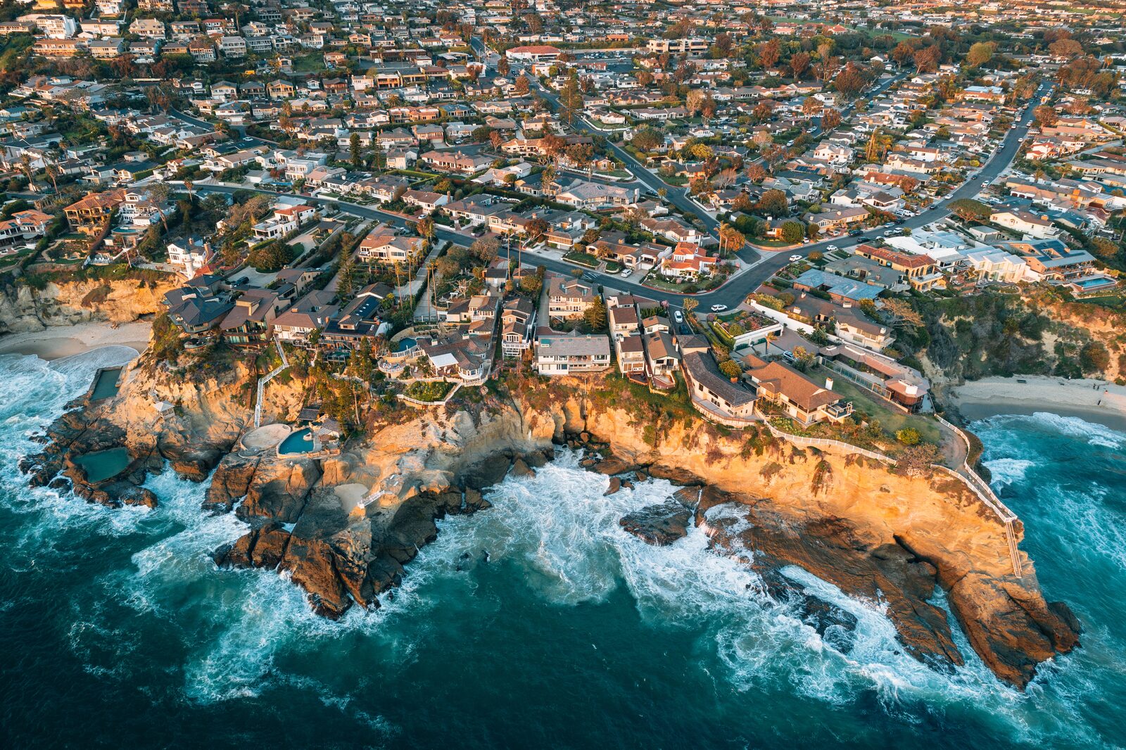 Laguna Beach cove and hillside homes above the water